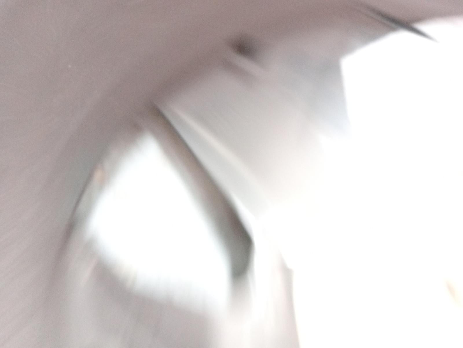 8975077
