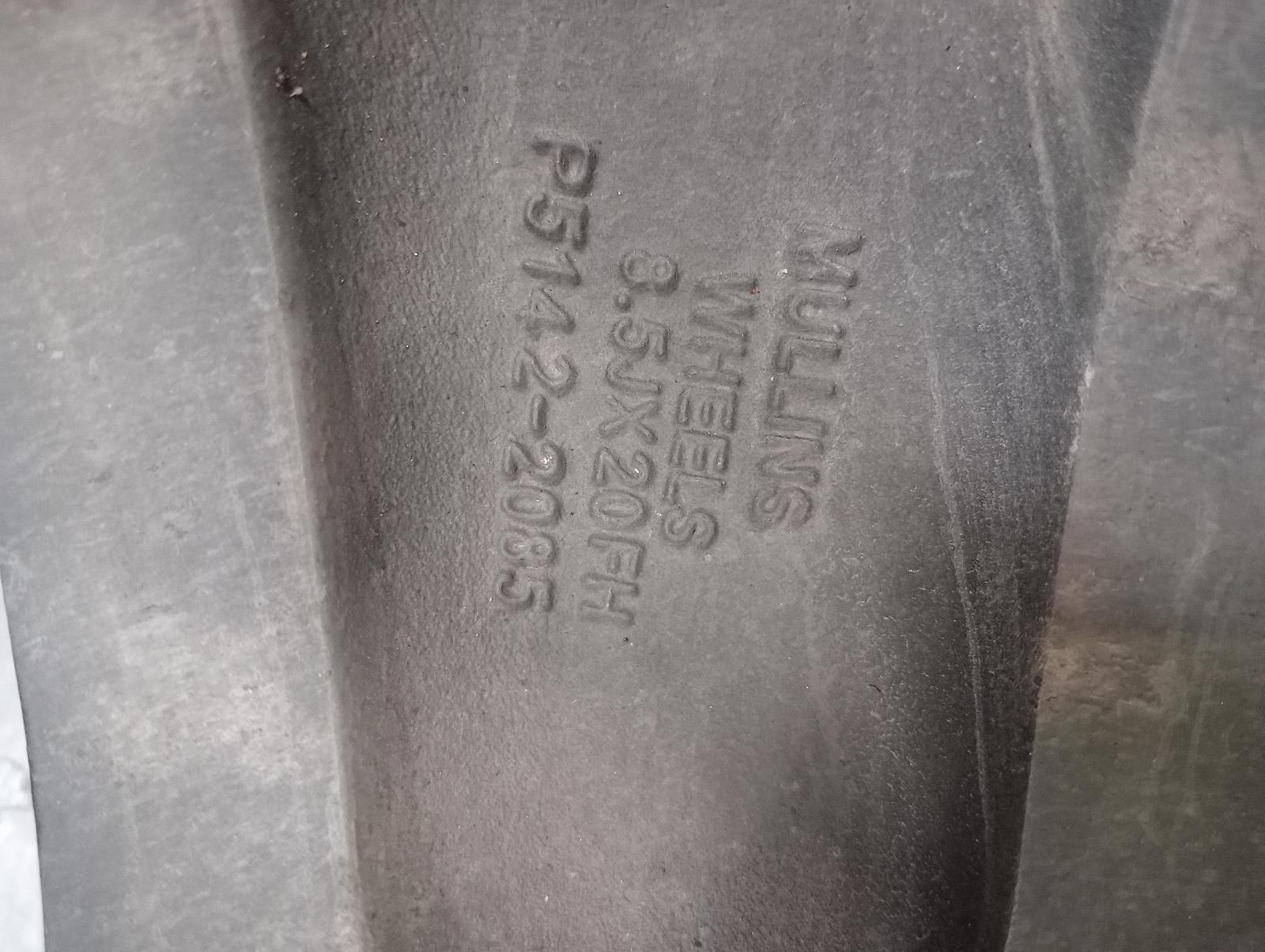 8976860