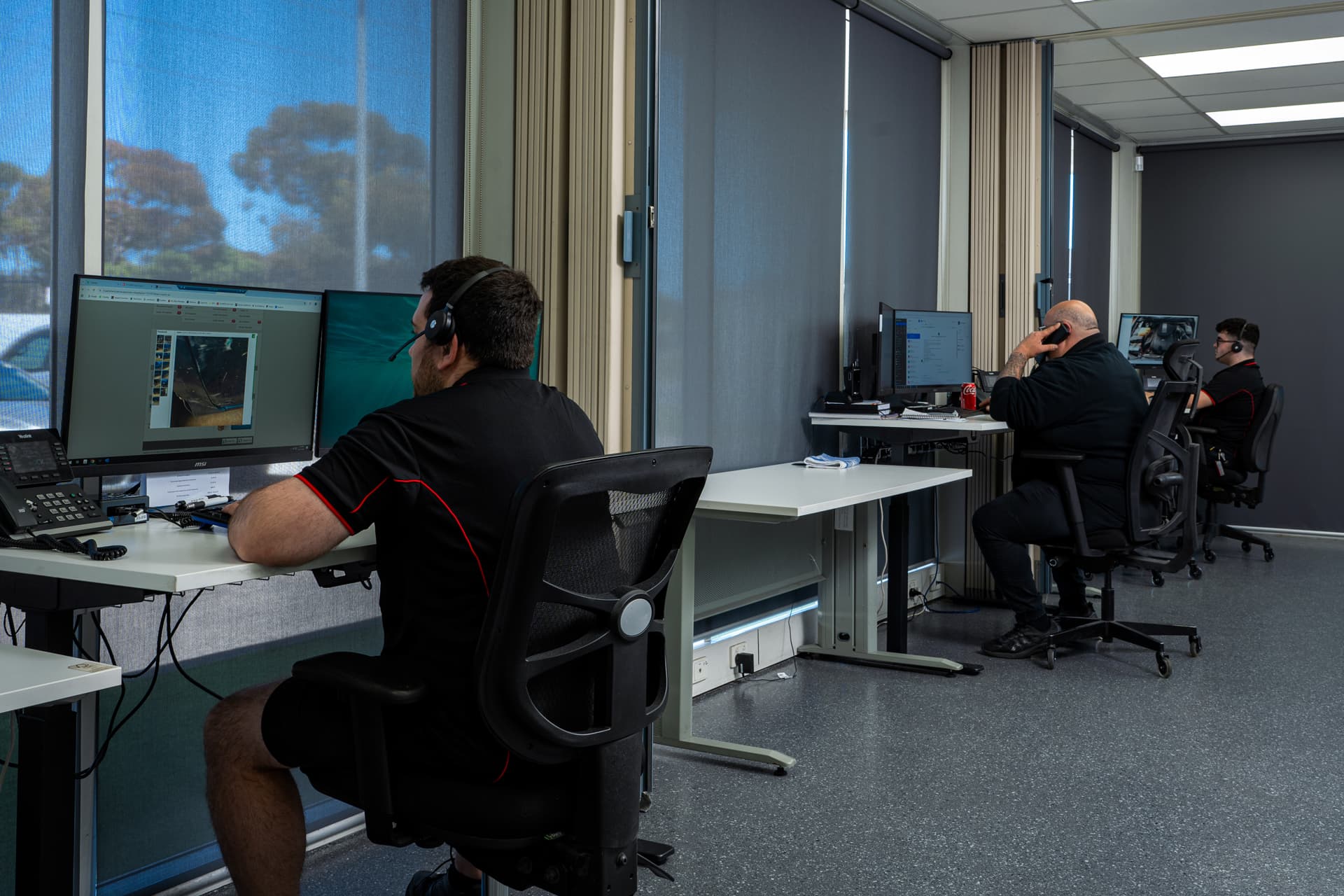 jcs parts office workers finding parts on computers