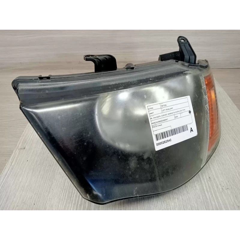 MITSUBISHI TRITON LEFT HEADLAMP ML, HALOGEN, CURVED, ORANGE BLINKER LENS TYPE, 0