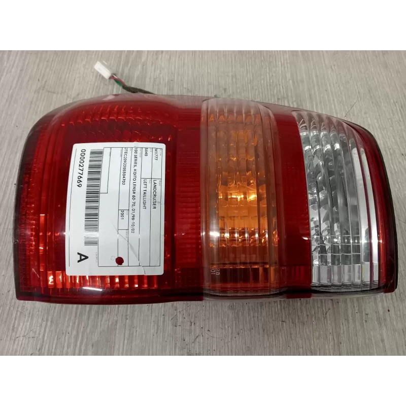 TOYOTA LANDCRUISER LEFT TAILLIGHT 100 SERIES, KOITO LENS# 60-70, 01/98-10/02 200