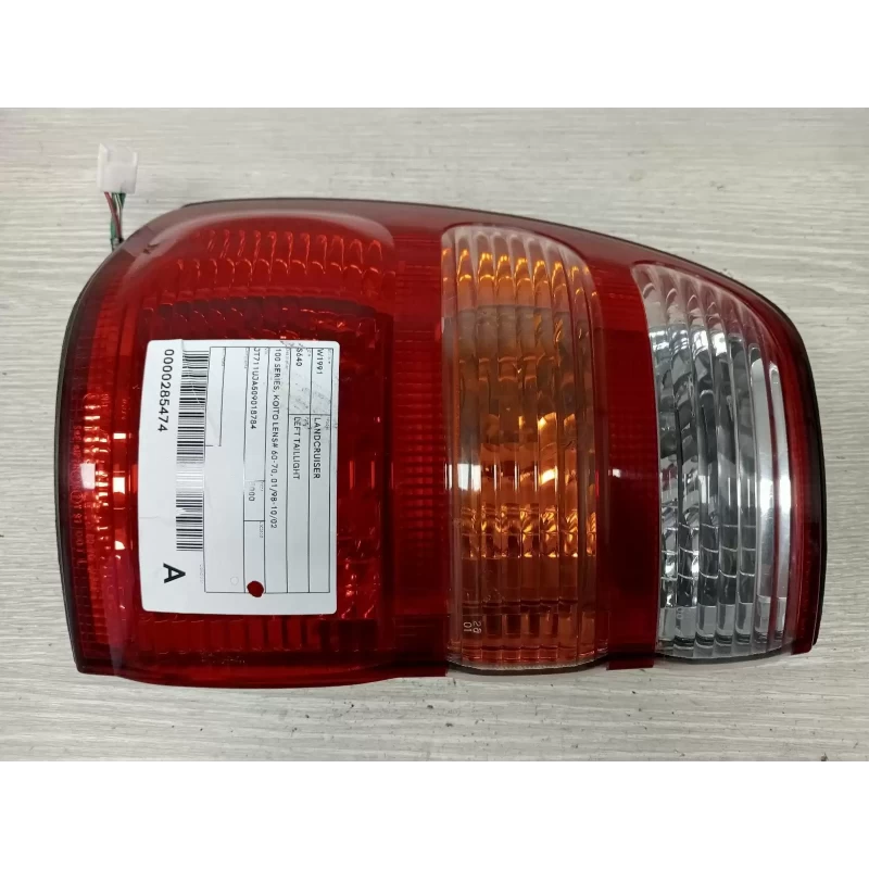 TOYOTA LANDCRUISER LEFT TAILLIGHT 100 SERIES, KOITO LENS# 60-70, 01/98-10/02 200