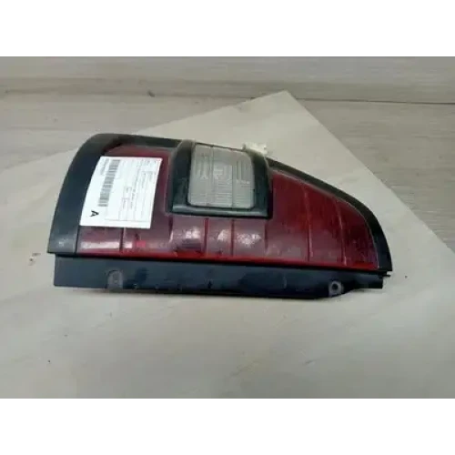 MITSUBISHI PAJERO LEFT TAILLIGHT NM, IN BODY, BLACK SURROUND TYPE, 05/00-10/02 2