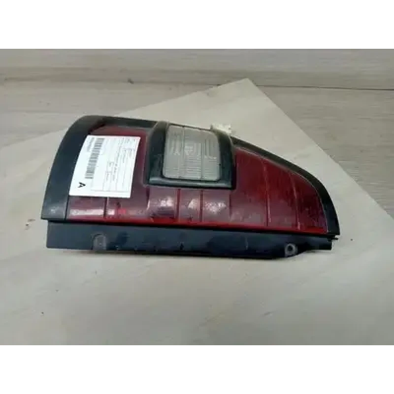 MITSUBISHI PAJERO LEFT TAILLIGHT NM, IN BODY, BLACK SURROUND TYPE, 05/00-10/02 2